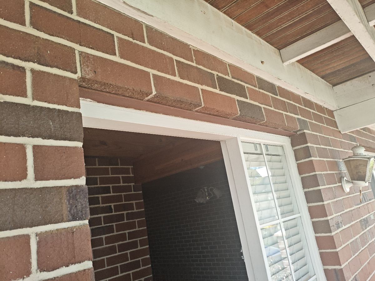 Cracking above a brick lintel found during a specific item inspection