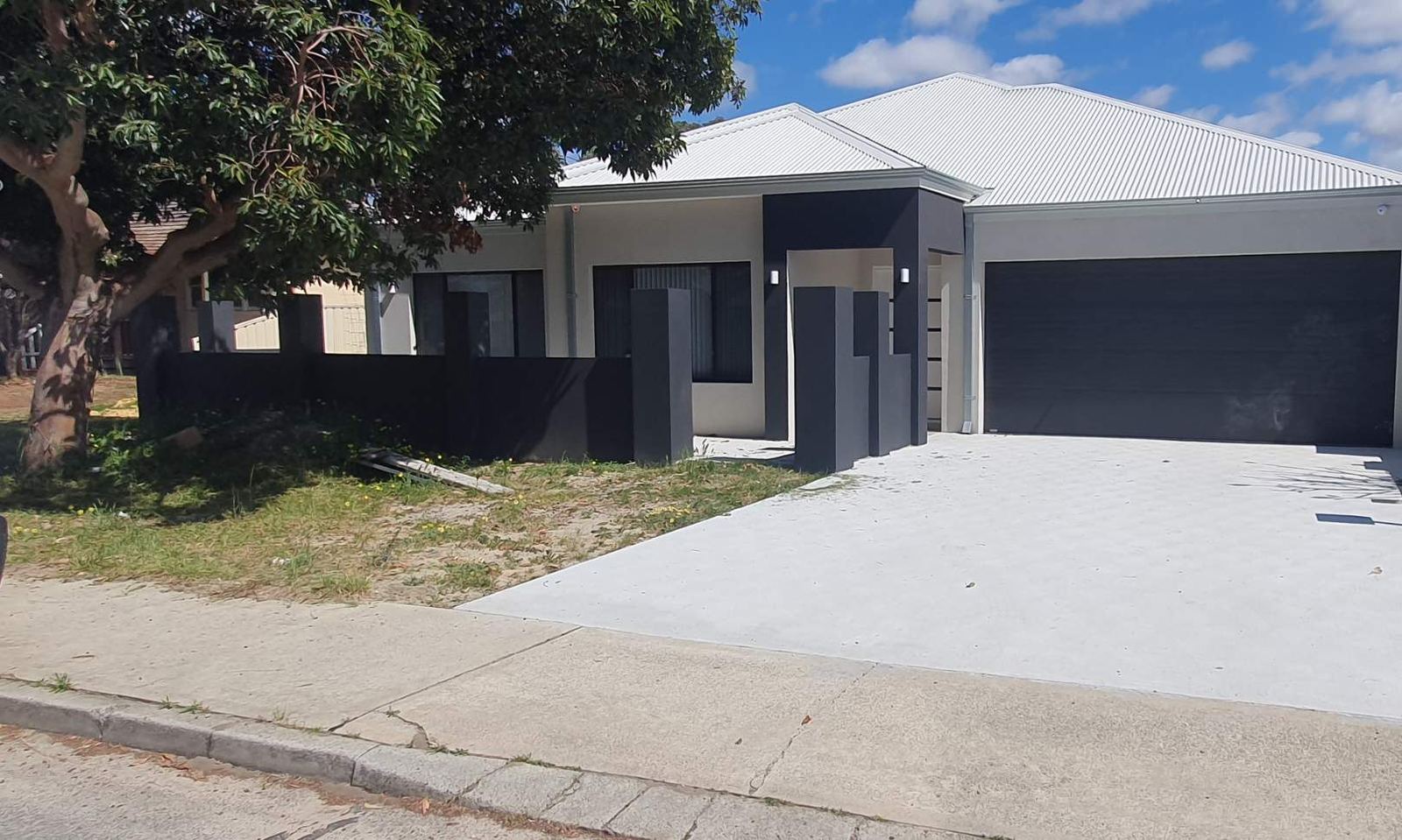 New build home frontage checked during a Practical Completion inspection before handover