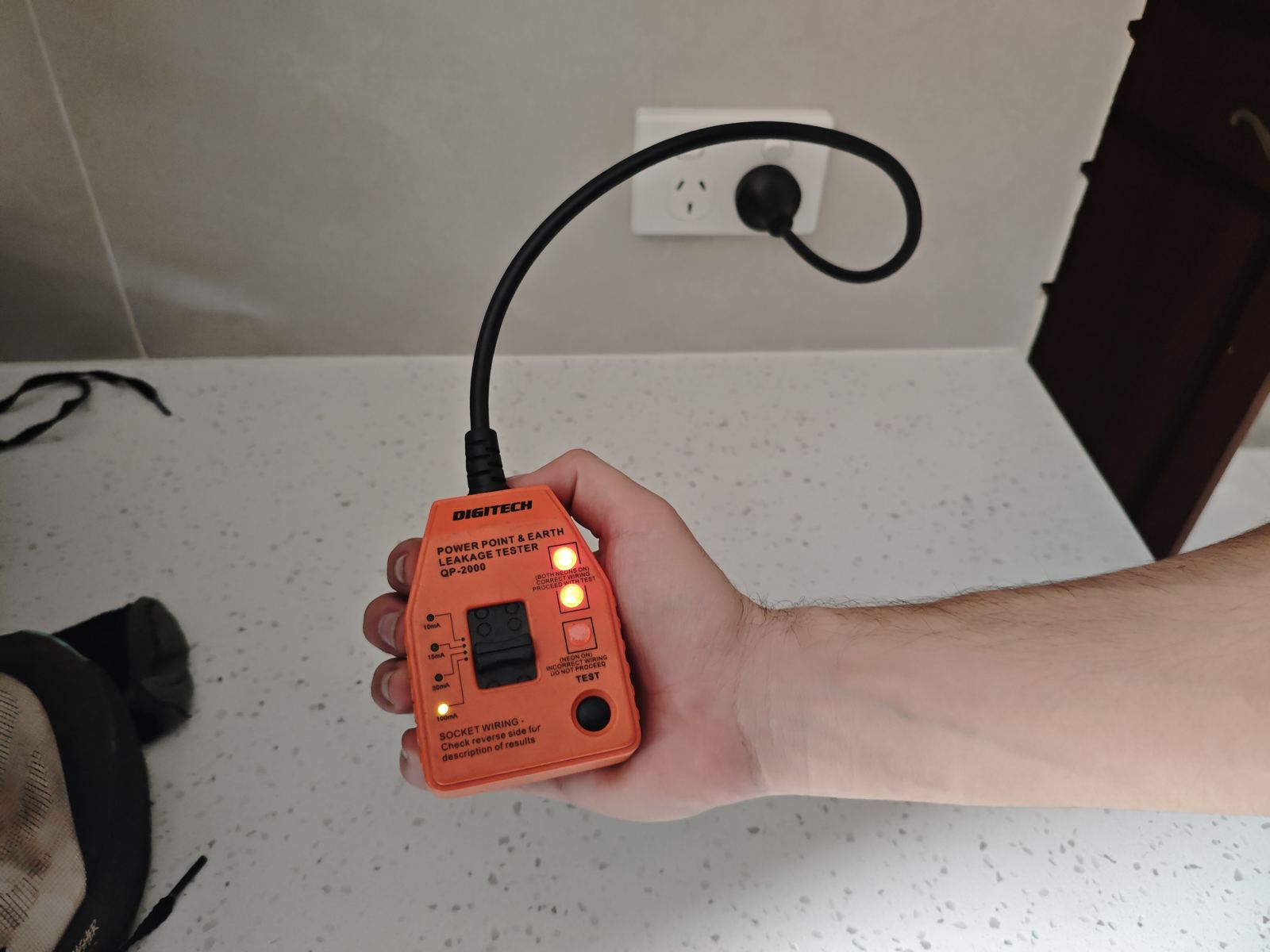 Power point and earth leakage tester used during a comprehensive inspection